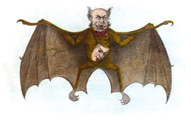 A vampire-man with wings spread and a mask hanging around his neck.